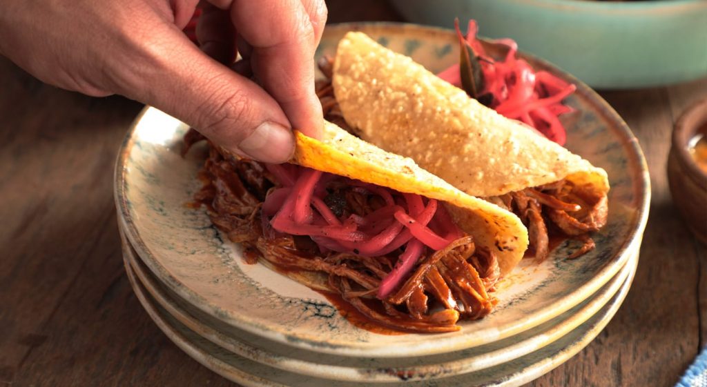 Historia de los Tacos de cochinita pibil de Mérida